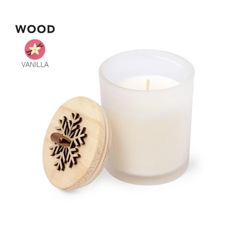 Vela de diseño navideño con aroma vainilla. Fabricada en cristal, con tapa de madera pulida y relieve diseñado en forma de copo de nieve. Presentada en atractiv