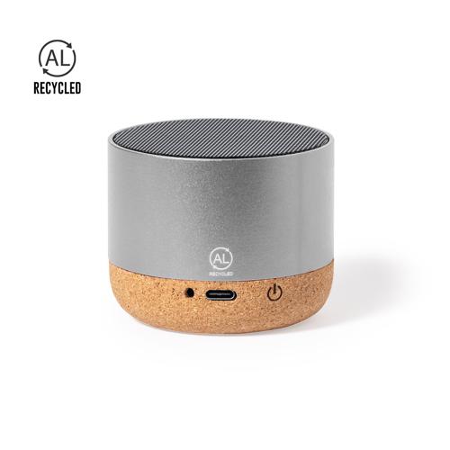 Altavoz fabricado en combinación eco con carcasa de aluminio reciclado y base de corcho natural. Con conexión Bluetooth y 3W de potencia. Batería de litio de 30