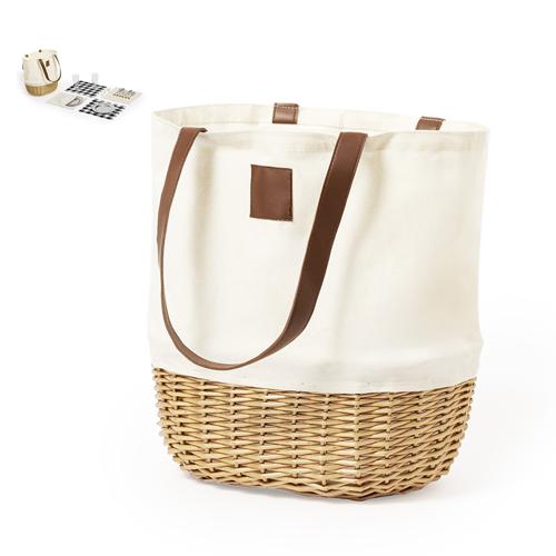 Eleva el estilo de tus picnics con esta cesta elegante y retro. Elaborada en mimbre y algodón de acabado natural, cuenta con una resistente asa de transporte en
