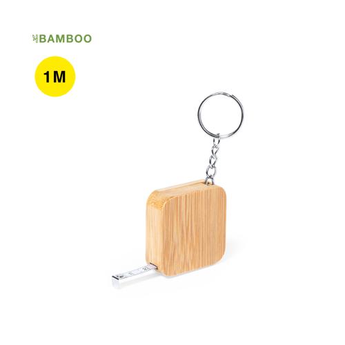 Flexómetro llavero fabricado en bambú. Con cuchilla metálica de 1 metro y medidas en centí metros.Materiales como el bambú fomentan la utilización de materias p