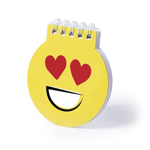 Libreta de divertidos diseños emoji en llamativo color amarillo. De anillas blancas, con tapas de cartón rígidas de suave acabado brillante y 40 hojas lisas.