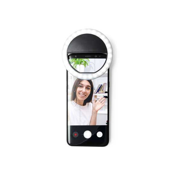 Anillo de luz led con acople para smartphone, fabricado en resistente ABS. 28 ledes, con 3 niveles de intensidad y recargable por USB (cable Micro USB incluido). Presentado en atractiva caja de diseño. Disponible manual en español e inglés.