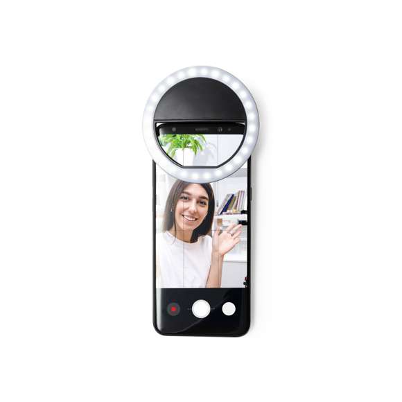 Anillo de luz led con acople para smartphone, fabricado en resistente ABS. 28 ledes, con 3 niveles de intensidad y recargable por USB (cable Micro USB incluido). Presentado en atractiva caja de diseño. Disponible manual en español e inglés.
