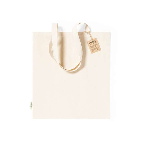 Bolsa fabricada en material100% algodón orgánico de 180g/m2 y en tono natural. Con certificación GOTS (Global Organic Textile Standard, ó Norma Mundial de Textiles Orgánicos) que garantiza que los tejidos están hechos de fibras orgánicas. De acabado cosido, con asas medianas reforzadas de 70 cm. Resistencia hasta 8kg, incluida etiqueta con distintivo de algodón orgánico y hangtag en cartón reciclado.