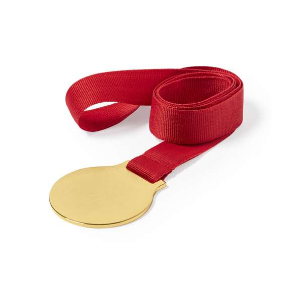 Medalla metálica de acabado dorado liso, con cinta de poliéster en rojo y especialmente diseñada para marcaje en impresión digital.