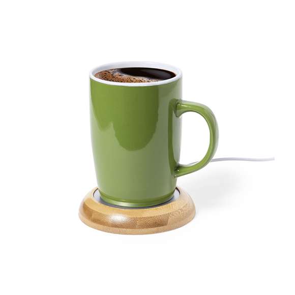 Calentador de tazas de línea nature, fabricado en bambú. Conexión USB y superficie metálica especialmente diseñada para mantener el calor, con base antideslizante en antelina. Presentado en caja individual de diseño eco. Disponible manual de instrucciones en español e inglés.