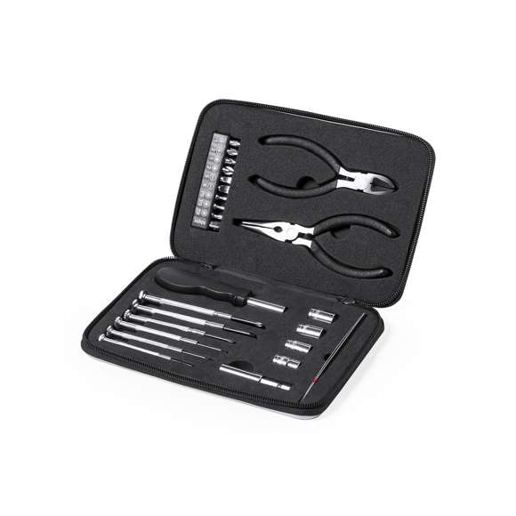 Set de herramientas de 25 accesorios en resistente estuche de aluminio con interior troquelado en EVA. Incluye set de destornilladores de precisión, mango multifunción, puntas intercambiables, destornilladores planos y de estrella  cabezales de tubo  pinzas y alicates. Presentado en caja individual.