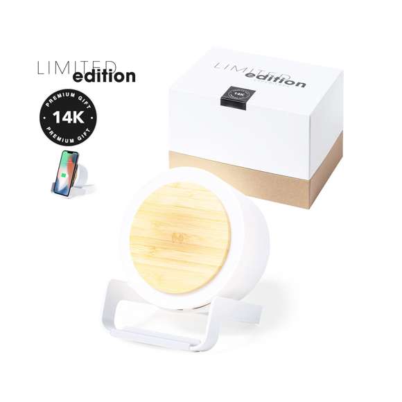 Lámpara multifunción Limited Edition con función altavoz, cargador inalámbrico y soporte para dispositivos móviles. Un moderno y sostenible diseño fabricado en bambú y carcasa en resistente ABS y caña de trigo, para así fomentar la utilización de materias primas naturales y reducir las emisiones contaminantes. Incluye función cargador inalámbrico 10W y lámpara de 12 ledes, con intensidad de luz regulable. Compatible con dispositivos móviles de carga inalámbrica, incluye cable cargador USB C de 100 cm. Altavoz Bluetooth con 3W de potencia. Disponible manual de instrucciones en Español e Inglés.  De la perfecta combinación entre exclusividad y diseño, nace Limited Edition, una colección especial de ideas promocionales de edidición limitada. Un nuevo concepto, inspirado en la fusión de artículos premium con las últimas y más novedosas tendencias y que cuenta con una seleción limitada de unidades, convirtiendo así un regalo en una experiencia única e inolvidable.  Exclusivo estuche de presentación Limited Edition, con diseño protegido por derechos de propiedad industrial.  Incluida tarjeta con descripción de Limited Edition en cartón reciclado.