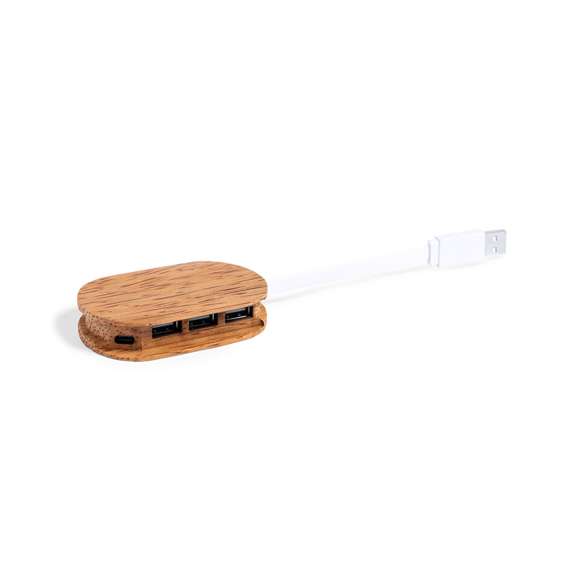  	Puerto USB 2.0 de línea nature fabricado en coco. Tras el consumo de su fruto, del coco y su planta se pueden obtener multitud de productos, contribuyendo a la sostenibilidad del planeta y fomentando el uso de materias primas naturales. Incluye 1 puerto Tipo C y 3 puertos USB. Presentado en caja individual de diseño eco en cartón kraft.