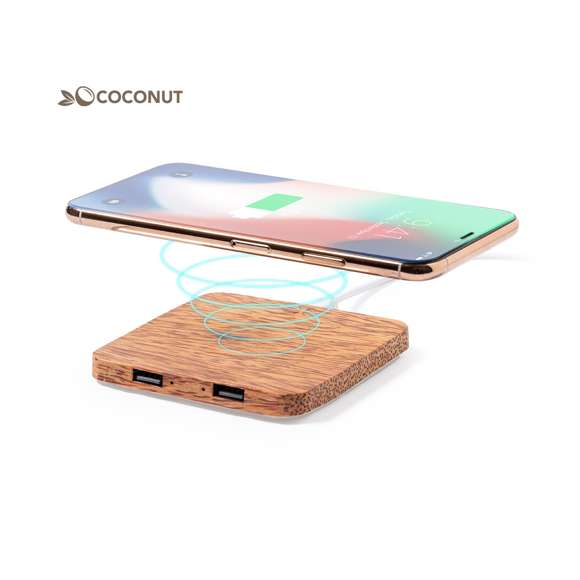 Cargador inalámbrico 10W de línea nature fabricado en coco. Tras el consumo de su fruto, del coco y su planta se pueden obtener multitud de productos, contribuyendo a la sostenibilidad del planeta y fomentando el uso de materias primas naturales. Incluye 2 salidas USB de 2100mA y es compatible con dispositivos equipados con tecnología de carga inalámbrica. Amplia superficie de marcaje y presentado en caja individual de diseño eco en cartón kraft.