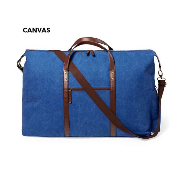 Elegante bolso fabricado en resistente canvas de 480g/m2, con prácticas y resistentes asas en polipiel alrededor del bolso. Compartimento principal con cierre de cremallera a juego con las asas y cinta para hombro ajustable con mosquetón. Incluye bolsillo exterior de fácil acceso.