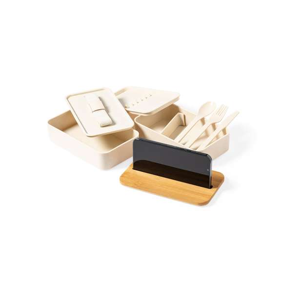 Original set de fiambreras de 1,4l en resistente material PP veteado libre de BPA. Original tapa de bambú con soporte para smartphone integrado. Dos compartimentos, cada uno de 700 ml de capacidad y compartimento interior con tenedor, cuchara y cuchillo. Incluye cinta de seguridad exterior. Certificación Food Grade, garantizando la seguridad cuando los alimentos entran en contacto con el material usado para fabricar el producto.