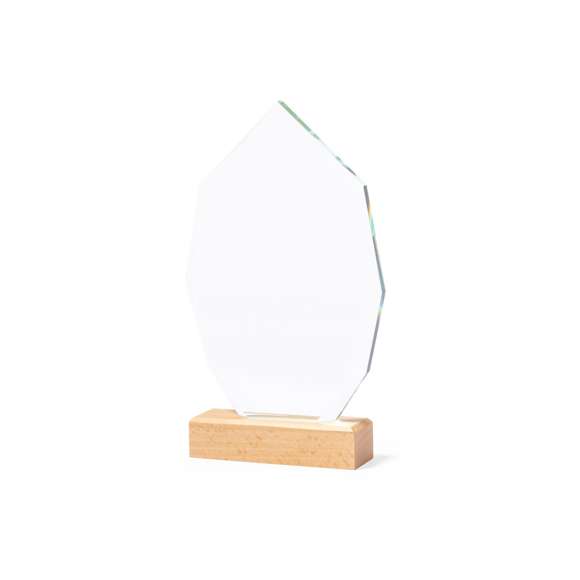 Placa conmemorativa fabricada en cristal grueso y resistente, con base en madera natural. Presentada en estuche de protección kraft, con cierre magnético y espuma interior.