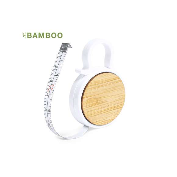 Flexómetro 1 m en resistente ABS blanco, con detalle en bambú en el cuerpo y anilla de transporte. Con amplia superficie de marcaje y hoja con medidas en centímetros y pulgadas.