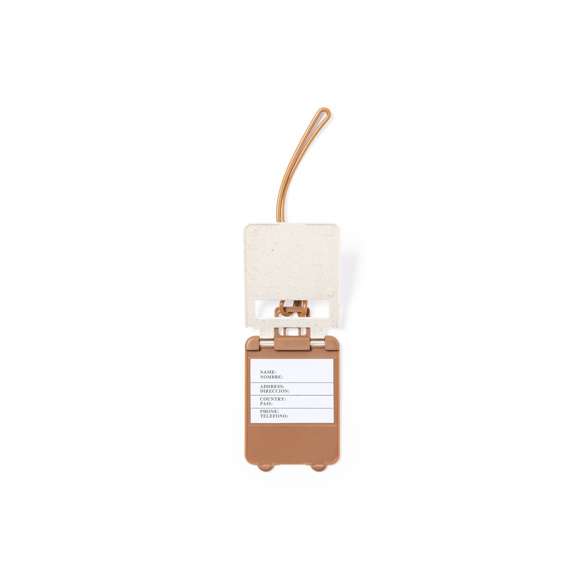 Identificador para maletas de línea nature y original diseño trolley, fabricado en caña de trigo. Con resistente cinta de acople y tarjeta de identificación en español e inglés.La caña de trigo fomenta la utilización de materias primas naturales, reduciendo así las emisiones contaminantes.