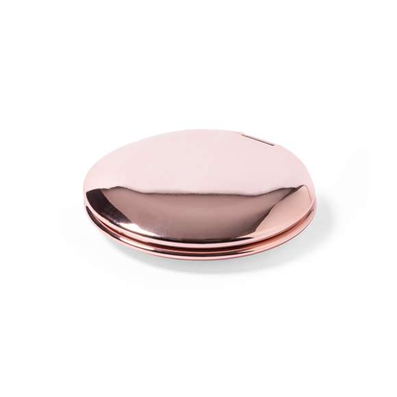 Espejo plegable en elegante acabado metalizado. Con dos espejos interiores (1X y aumento 2X), disponible en colores dorado, plateado y oro rosa.