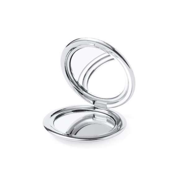 Espejo plegable en elegante acabado metalizado. Con dos espejos interiores (1X y aumento 2X), disponible en colores dorado, plateado y oro rosa.