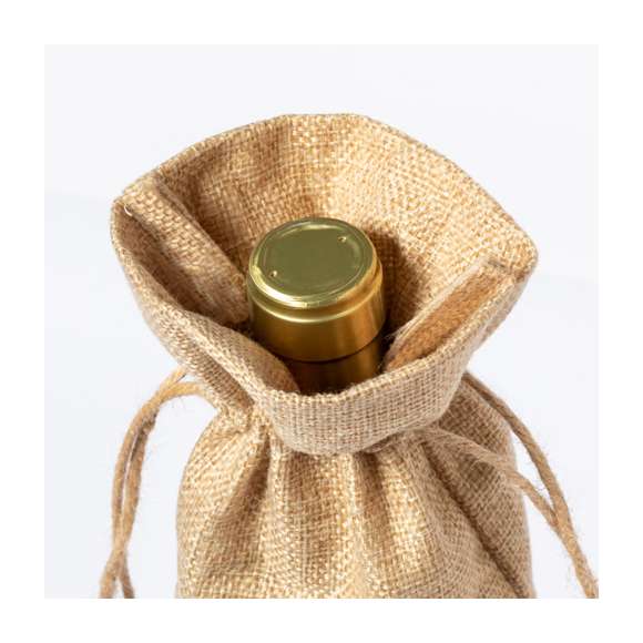 Bolsa para botellas de inspiración nature. Con cierre de cordón en yute e ideal para botellas de 750 ml.