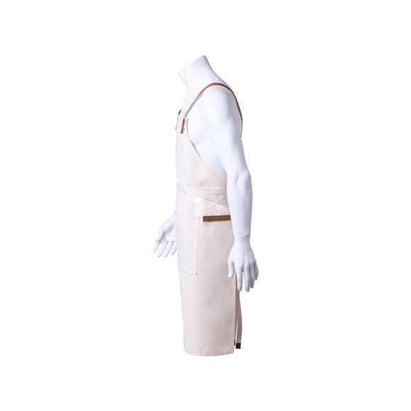 Delantal de alta calidad en resistente material 100% algodón canvas de 340g/m2, con costuras reforzadas. De corte por debajo de la rodilla, con cintas en resistente polipiel y triple ajuste: cuello, espalda y cintura. Con bolsillo frontal, accesorio en polipiel y remaches metálicos de refuerzo.