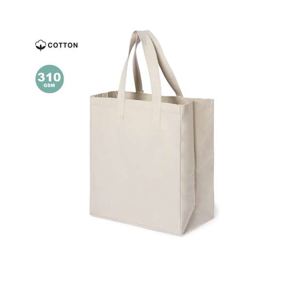 Bolsa XL de gran capacidad fabricada en algodón 100%, de acabado natural y en gramaje extra de 310g/m2. De acabado cosido y con fuelle. Asas largas extra anchas y reforzadas (72 x 3,5 cm). Resistencia hasta 10 kg de peso.