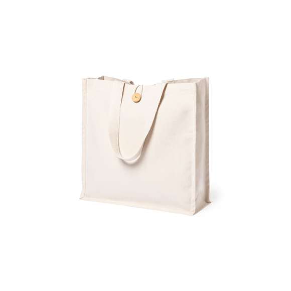 Bolsa fabricada en algodón 100%, de acabado natural y en gramaje extra de 310g/m2. Con original cierre de botón, acabado cosido y con fuelle. Asas medianas extra anchas y reforzadas (60 x 3,5 cm). Resistencia hasta 10 kg de peso.