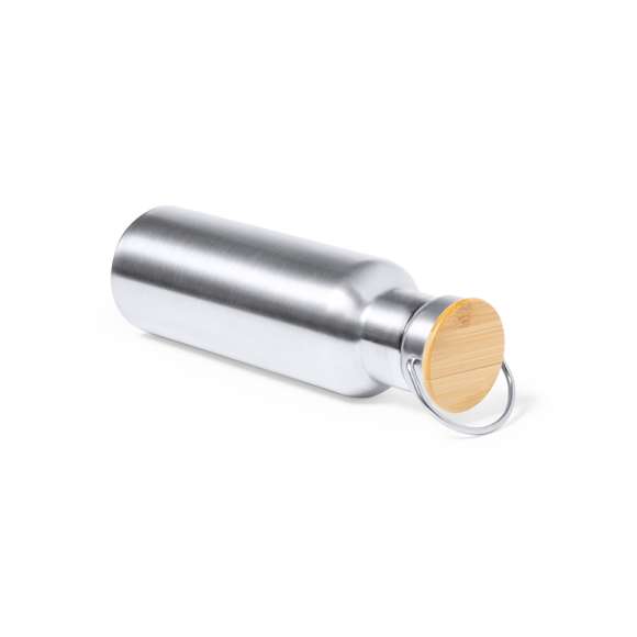 Bidón térmico de 500 ml de capacidad, fabricado en acero inox de doble pared y acabado mate. Incluye original tapón a rosca en acero inox, con detalle de bambú y asa integrada. Libre de BPA y presentado en caja individual de diseño kraft.