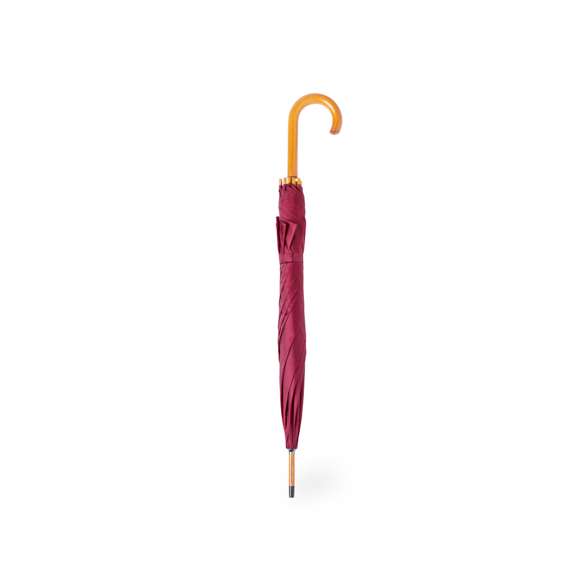 Paraguas de 8 paneles y 105 cm de diámetro, en resistente material poliéster 190T. De apertura automática, con mango curvado y caña, ambos en madera. Varillas metálicas en color negro, tira con cierre de velcro y disponible en variada gama de colores.