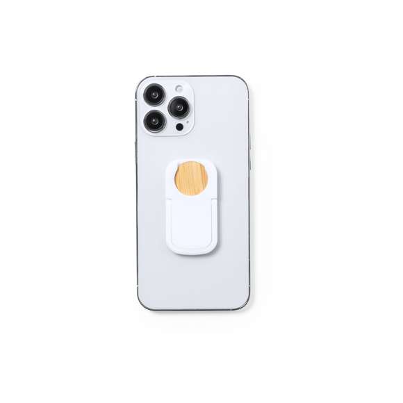 Soporte multifunción para smartphone, con moneda para carro de la compra integrada y anilla/soporte plegable. Cuerpo fabricado en resistente ABS de acabado blanco, con moneda en bambú. Con adhesivo de fijación extra fuerte y libre de residuos al despegarlo del dispositivo.