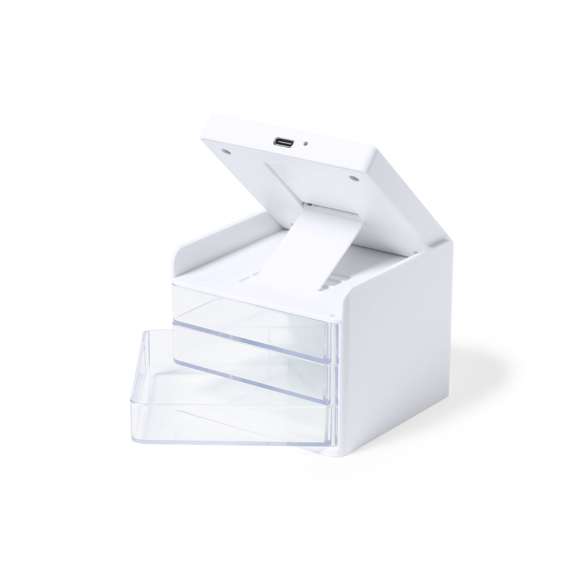 Cargador organizador con soporte para smartphone y cargador inalámbrico 10W integrado, compatible con dispositivos equipados con tecnología de carga inalámbrica Qi. Con 3 compartimentos de almacenaje transparentes y extraíbles. Indicador de estado de carga, con cable de carga Tipo C de 1 m incluido. Base antideslizante y presentado en caja individual de diseño kraft, con manual de instrucciones en español e inglés.Fabricado conforme a los estándares RoHS y en cumplimiento con los siguientes requisitos de seguridad:Sistema de protección contra sobrecalentamiento.Sistema de protección contra sobrecarga.Sistema de bloqueo para evitar cortocircuitos.