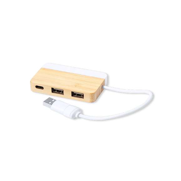 Puerto USB 2.0 de línea nature. Fabricado en bambú, con detalle en extracto de mármol. Incluye puerto Tipo C y 2 puertos USB, con entrada dual USB/Tipo C. Presentado en caja individual de diseño kraft.Fabricado conforme a estándares RoHS, con sistema de bloqueo para evitar cortocircuitos.