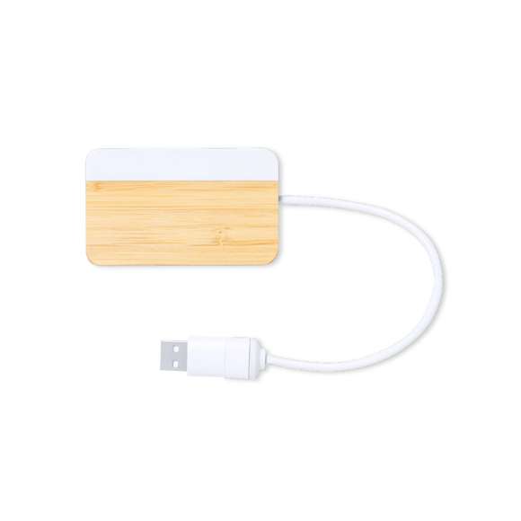 Puerto USB 2.0 de línea nature. Fabricado en bambú, con detalle en extracto de mármol. Incluye puerto Tipo C y 2 puertos USB, con entrada dual USB/Tipo C. Presentado en caja individual de diseño kraft.Fabricado conforme a estándares RoHS, con sistema de bloqueo para evitar cortocircuitos.