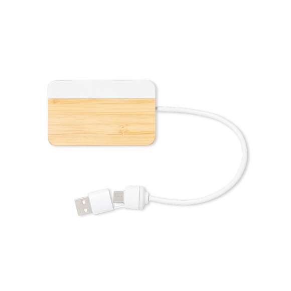 Puerto USB 2.0 de línea nature. Fabricado en bambú, con detalle en extracto de mármol. Incluye puerto Tipo C y 2 puertos USB, con entrada dual USB/Tipo C. Presentado en caja individual de diseño kraft.Fabricado conforme a estándares RoHS, con sistema de bloqueo para evitar cortocircuitos.