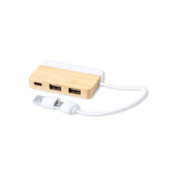 Puerto USB 2.0 de línea nature. Fabricado en bambú, con detalle en extracto de mármol. Incluye puerto Tipo C y 2 puertos USB, con entrada dual USB/Tipo C. Presentado en caja individual de diseño kraft.Fabricado conforme a estándares RoHS, con sistema de bloqueo para evitar cortocircuitos.