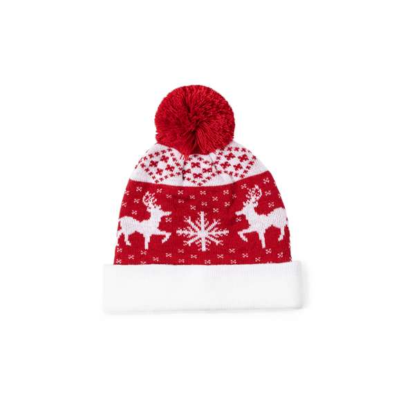 Original gorro con motivos navideños. Un regalo ideal para combatir el frío y agregar un toque de calidez y diversión a los looks más navideños. Fabricado en suave poliéster acrílico y pom pom a juego. Presentado en una bolsa individual reciclada. Cuenta con zona especial para el marcaje.