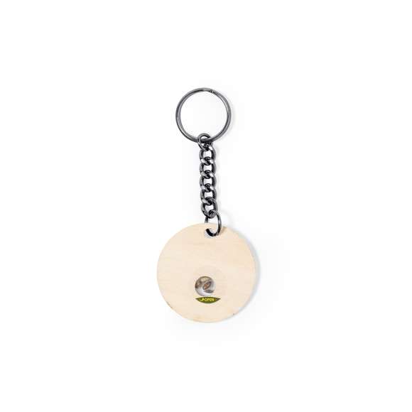Llavero en suave y elegante madera de haya. Incluye cápsula con semillas de pino. Un respetuoso y sostenible regalo con el que fomentar y promover el cuidado del medio ambiente. Presentado en caja individual de diseño kraft.
