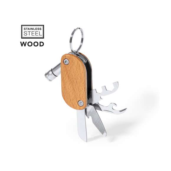 Práctico llavero multiherramienta fabricado en resistente acero inox y madera. Con 9 funciones: destornillador, abrebotellas, cuchillo, abrelatas, lima, distintas llaves y linterna de un led. Alimentación a pilas (3 pilas de botón incluidas) y presentado en caja individual de diseño kraft.