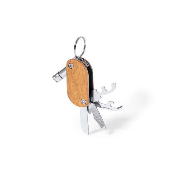 Práctico llavero multiherramienta fabricado en resistente acero inox y madera. Con 9 funciones: destornillador, abrebotellas, cuchillo, abrelatas, lima, distintas llaves y linterna de un led. Alimentación a pilas (3 pilas de botón incluidas) y presentado en caja individual de diseño kraft.