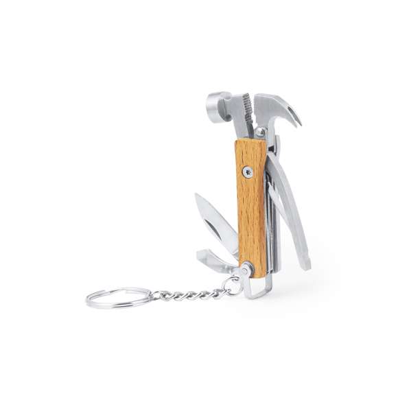 Práctico llavero multiherramienta fabricado en resistente acero inox y madera. Con 7 funciones: martillo, destornillador plano pequeño, alicates, cuchillo, pelacables, lima y abrebotellas. Presentado en caja individual de diseño kraft.