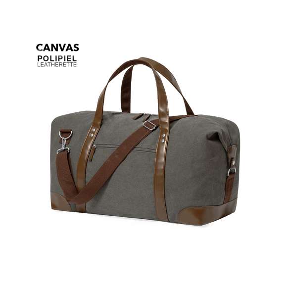 Elegante bolso fabricado en resistente canvas de 475g/m2 gris, con prácticas y resistentes asas en polipiel alrededor del bolso y esquinas reforzadas. Compartimento principal con cierre de cremallera a juego con las asas y cinta para hombro ajustable con mosquetón. Incluye bolsilo exterior de fácil acceso.Presentado en bolsa individual reciclada.