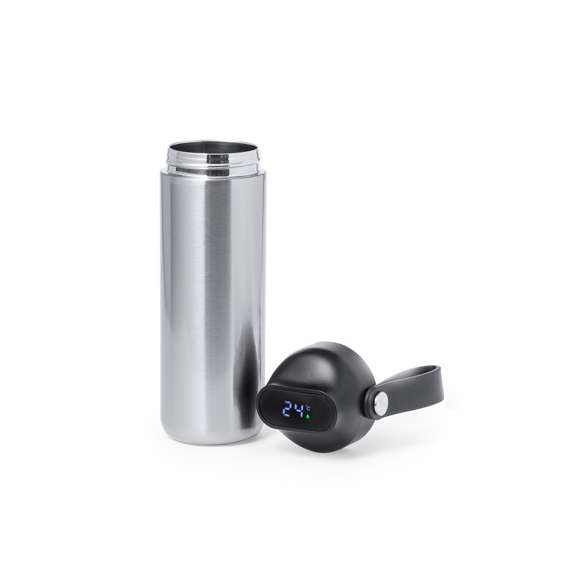 Bidón térmico de acero inox y doble pared de 630 ml de capacidad, con medidor de temperatura táctil en tapón y asa integrada. Con tapón de seguridad libre de BPA y presentado en atractiva caja individual de diseño Kraft y en bolsa reciclada. Alimentación a pilas (de botón incluida), con manual de instrucciones disponible en español e inglés.