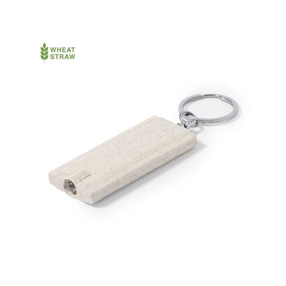 Llavero linterna de fabricado en caña de trigo y ABS.1 LED, con alimentación a pilas (de botón incluidas). Distintivo Wheat Straw y presentado en bolsa individual reciclada.Elaborado con elementos vegetales para así fomentar la utilización de materias primas naturales y reducir las emisiones contaminantes.