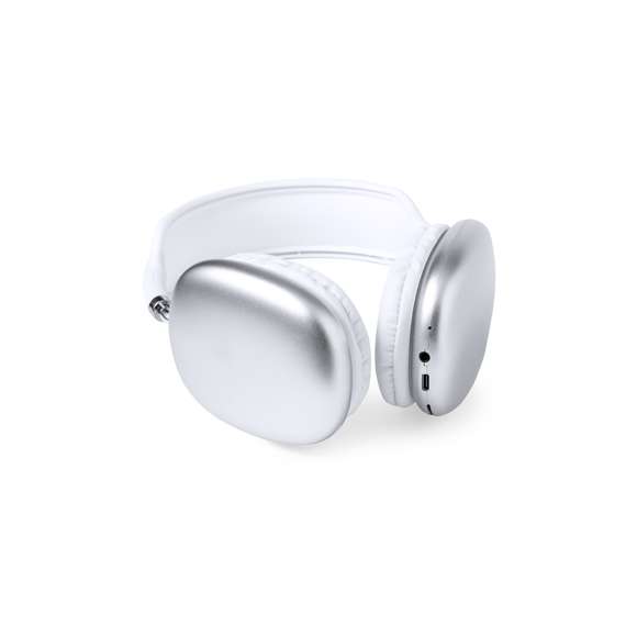 Originales auriculares de diadema con conexión Bluetooth 5.0, de diseño vanguardista y almohadillas cuadradas, en combinación de colores blanco y plateado. Panel de control integrado en el auricular, función manos libres y ranura para tarjetas microSD. Entrada de línea mediante conexión Jack de 3,5mm, incluido cable de 1m. Recargables mediante cable USB (incluido de 30 cm) y con batería de 150 mAh. Presentado en una caja individual de diseño kraft, con papel protector.