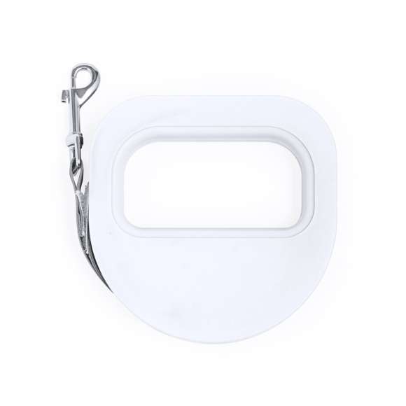 Cinta de paseo de 3 metros, fabricada en resistente poliéster, con carcasa en robusto ABS. Cómoda empuñadura ergonómica y práctico compartimento con tapadera para almacenar las bolsas. Incluye mosquetón metálico de enganche giratorio y viene presentada individualmente en caja de diseño kraft.