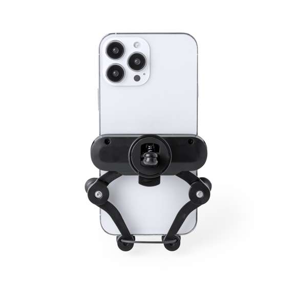 Ingenioso soporte para smartphone de diseño minimalista y especialmente diseñado para smartphones tamaño XXL. Con sistema de fijación universal que se adapta con el propio peso del teléfono, ajustando los enganches de agarre una vez se sitúa el dispositivo en el soporte. Para rejilla de ventilación del automóvil y con frontal especialmente diseñado para marcaje. Presentado en caja de diseño kraft.