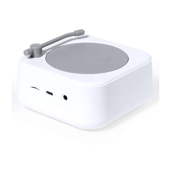 Altavoz Bluetooth en original forma de tocadiscos, de tamaño compacto y 5W de potencia. Batería de litio de 800mAh, con cable de carga Tipo C incluido e indicador luminoso de estado de carga. Función manos libres y radio FM, con ranura para tarjetas micro SD de hasta 32 GB de capacidad y una entrada auxiliar para conector jack de 3,5 mm. Fabricado en resistente ABS blanco con detalles en gris y presentado en caja individual de diseño kraft, con manual de instrucciones en español e inglés.