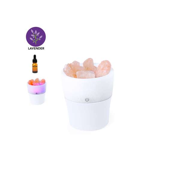 Elegante y decorativo humidificador con difusor aromático integrado con sal del Himalaya. Con luz led en iluminación multicolor y vaporización continua. Depósito de 150 ml, para uso en estancias de hasta 25m2, y cable de corriente USB. Incluye 10 ml de aroma a lavanda. Presentado en caja de diseño kraft.