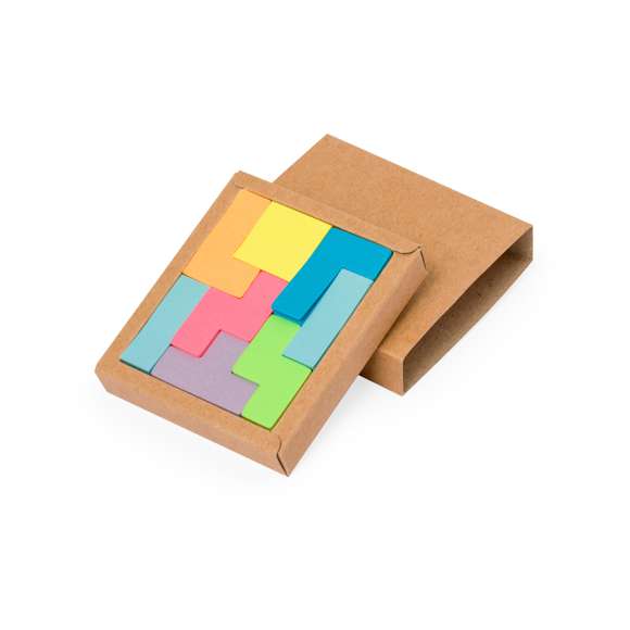 Portanotas fabricado en cartón reciclado. Con 200 mininotas adhesivas en diferentes colores y formas geométricas. Presentados en una caja de cartón reciclado con funda.