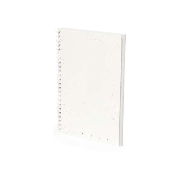 Libreta de anillas con tapas blandas fabricadas en papel de semilla. Con 80 hojas blancas lisas. Las cubiertas incluyen semillas de petunia, convirtiéndolo en papel plantable al final de su vida útil. Incluye instrucciones de plantado en la cubierta trasera y se presenta en una bolsa individual de papel reciclado.