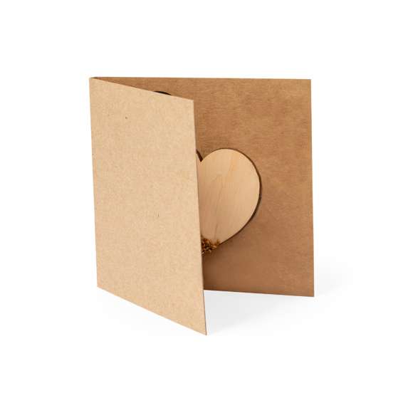 Corazón de semillas fabricado en madera natural, con semillas de flores silvestres listas para plantar. Presentado en una elegante tarjeta de cartón reciclado, con instrucciones de plantado y amplia superficie de marcaje.