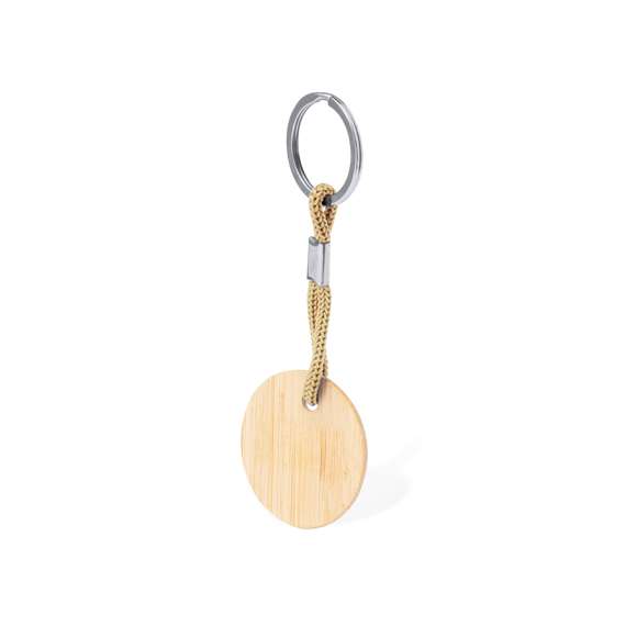 Práctico llavero redondo, fabricado en bambú, con cordón en variados colores. Es ideal para el marcaje en láser. Materiales como el bambú fomentan la utilización de materias primas naturales, reduciendo las emisiones contaminantes. Proviene de una planta de gran resistencia y versatilidad, con crecimiento y regeneración rápidos, siendo una excelente alternativa al uso de madera tradicional.